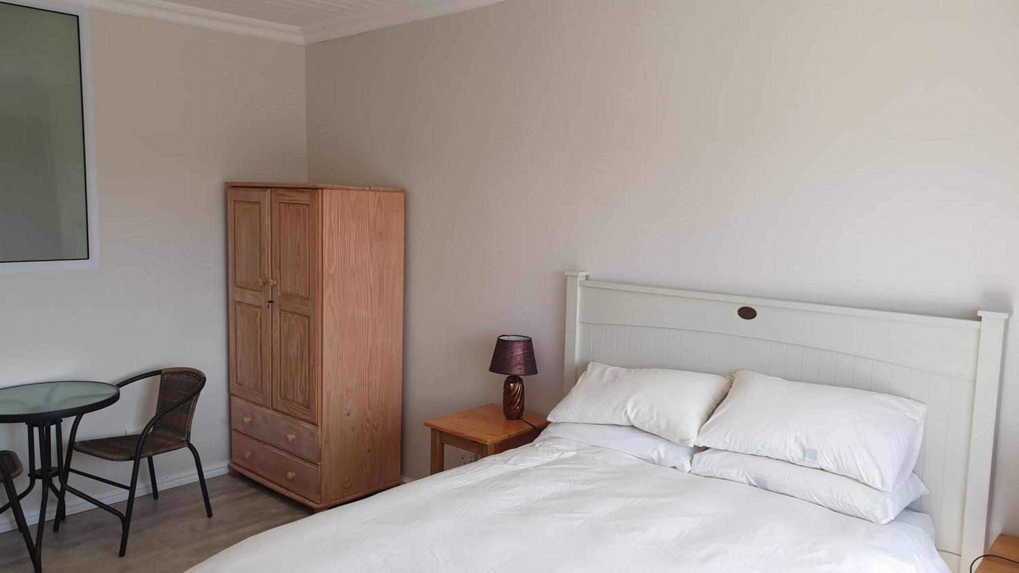 Hotel Stonehouse On Main à Struisbaai Chambre photo