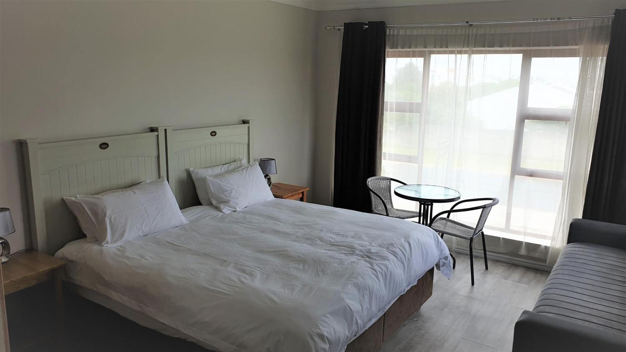 Hotel Stonehouse On Main à Struisbaai Chambre photo